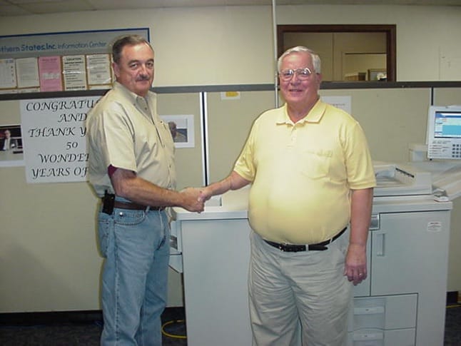 bennie shaking hands 50 years of service